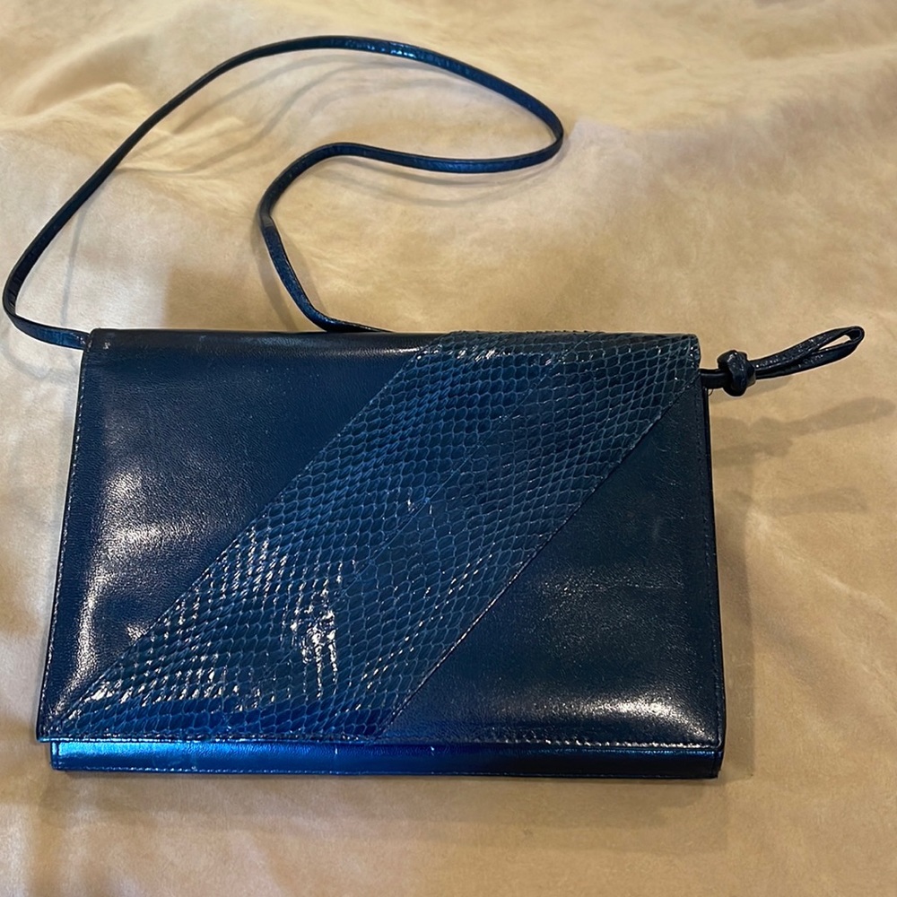 Deep blue Towanny clutch/crossbody purse. 9” tall & 6” wide.